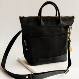 Black Canvas Leather Satchel with Adjustable Strap and Top Handle